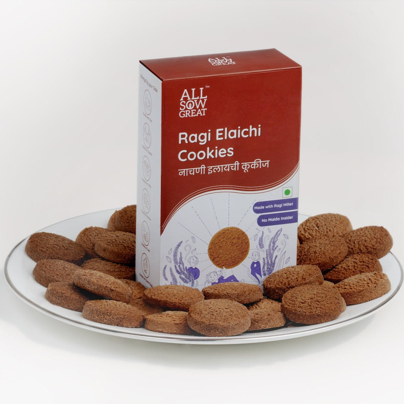 Ragi elaichi cookies in dish with packing box Ragi Elaichi cookies